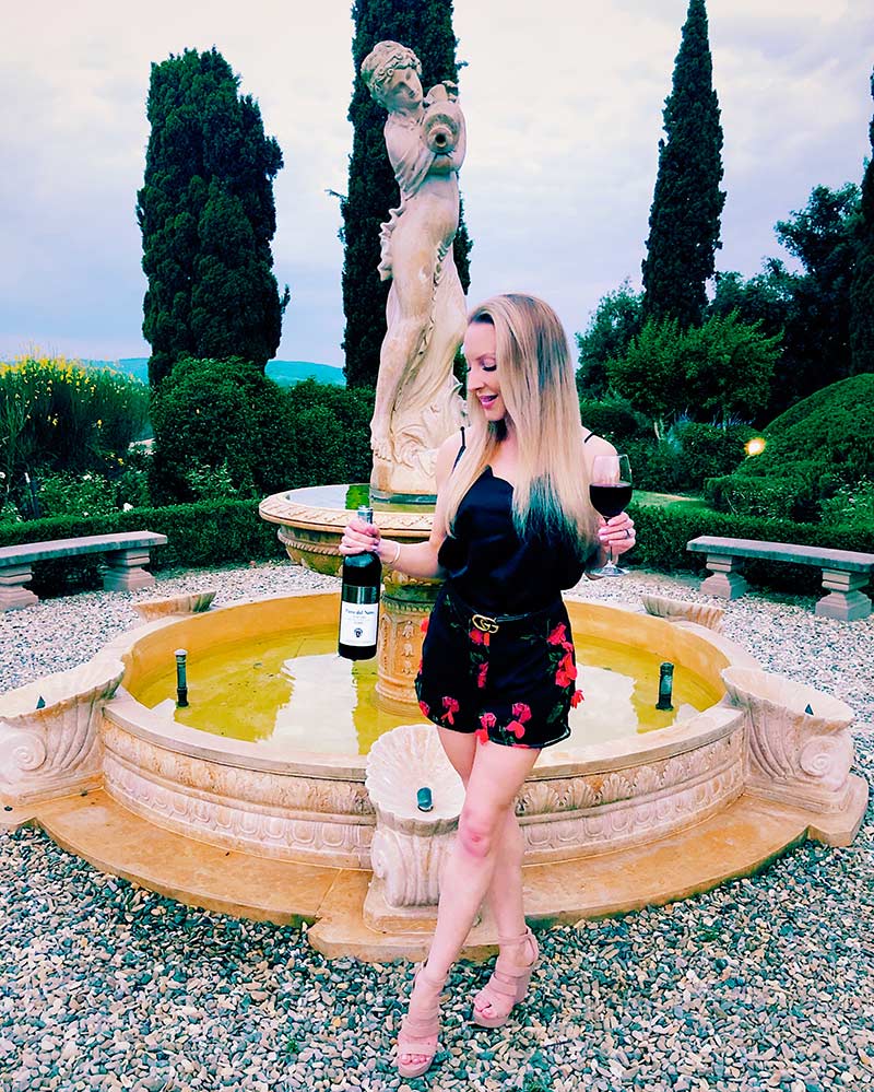 castle hotels tuscany fountain red wine