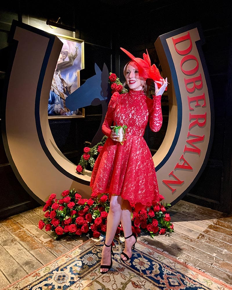 red kentucky derby hat and outfit run of the roses theme