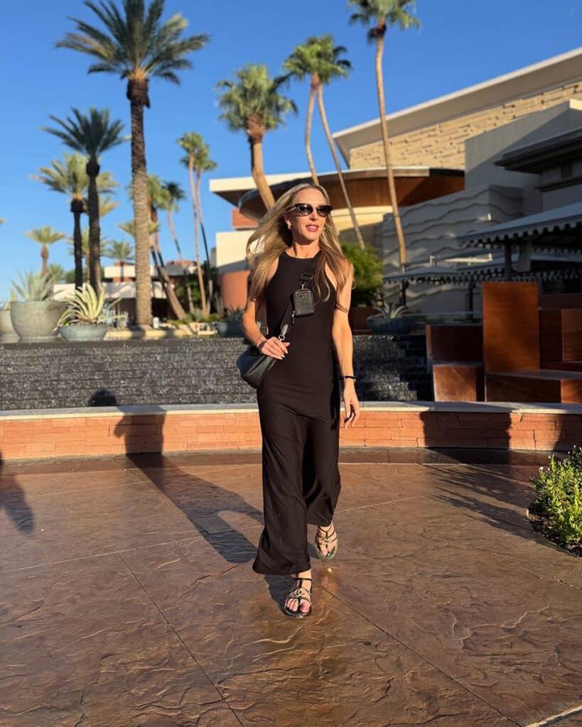 Prada Re-Edition 2005 Bag black leather worn by fashion editor Eve Dawes in Las Vegas