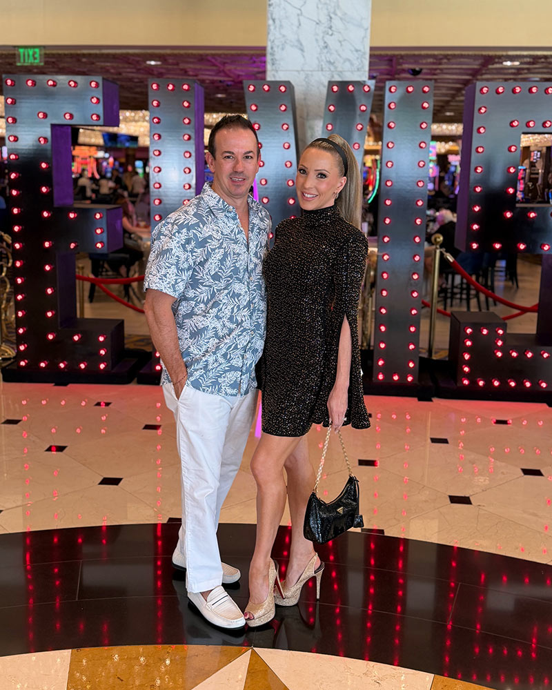 Prada sequin bag black gold on Eve Dawes fashion editor Best Luxury Handbags at Elvis concert Las Vegas